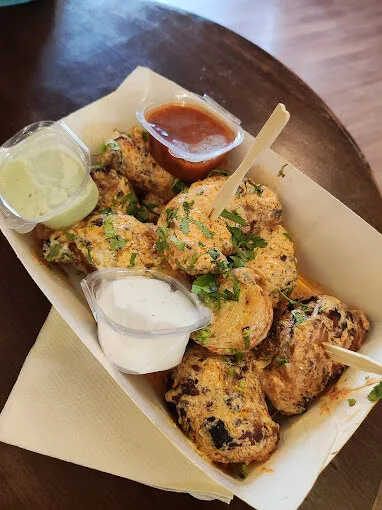 A plate of Tandoori momos by Hunger Strike