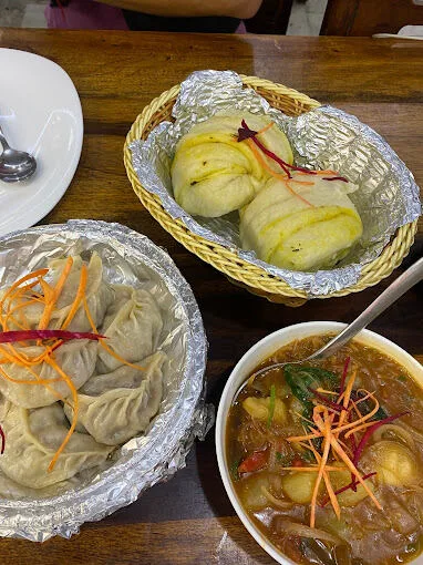 A table with different Nepalese Dishes